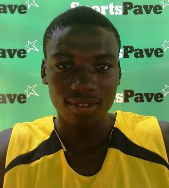 Martin Holdbrooke in his yellow and black basketball jersey